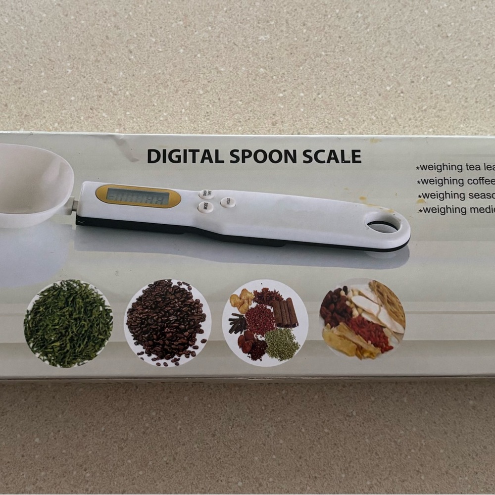 New never opened.Digital Spoon Scale in White
